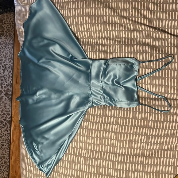 This dress is from Diva life, it is medium, running small on the bust and teal - Picture 2 of 3